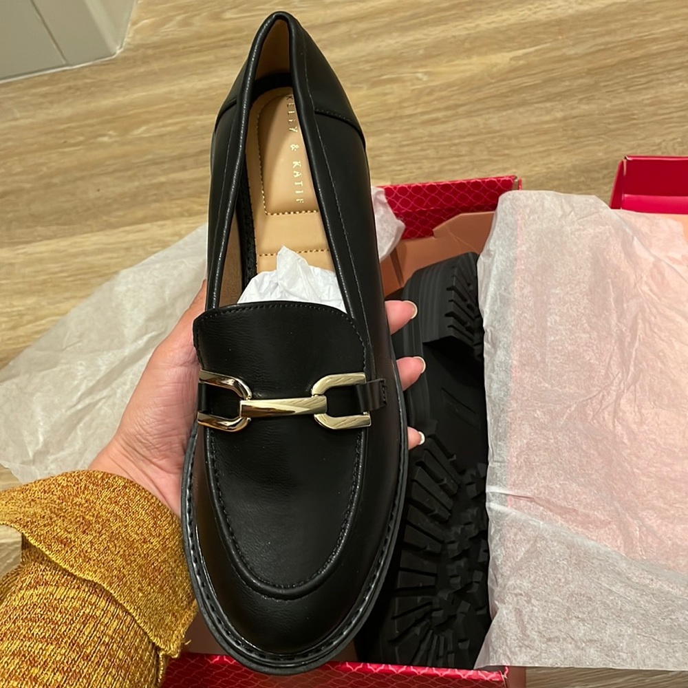 BRAND NEW NEVER USED BEAUTIFUL BLACK AND GOLD LOAFERS